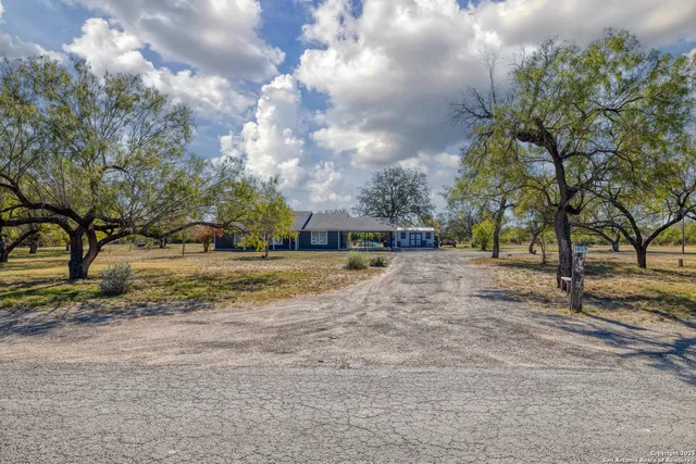 a view of road with trees
