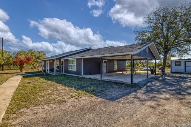 a view of a yard in front of a house