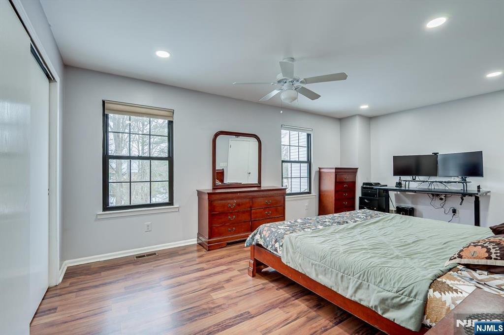 304 Maplecrest Road, Unit 304 Edison, NJ 08820 - Photo 27 of 38 a bedroom with bed tv and window