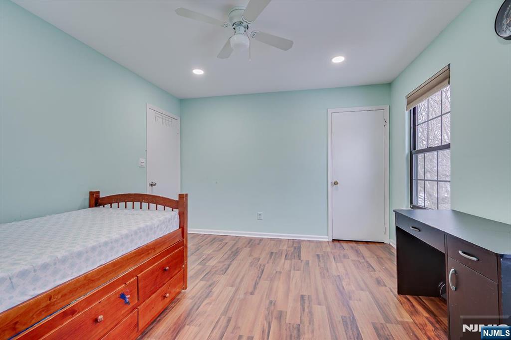 304 Maplecrest Road, Unit 304 Edison, NJ 08820 - Photo 30 of 38 a view of room with window and wooden floor