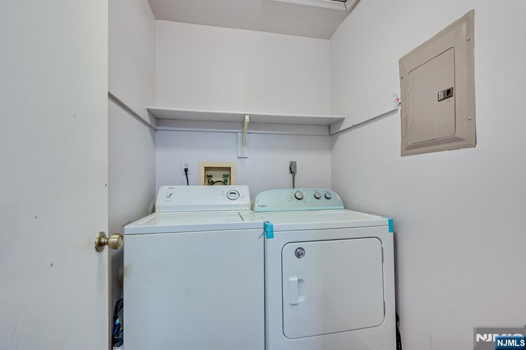 304 Maplecrest Road, Unit 304 Edison, NJ 08820 - Photo 31 of 38 a utility room with dryer and washer