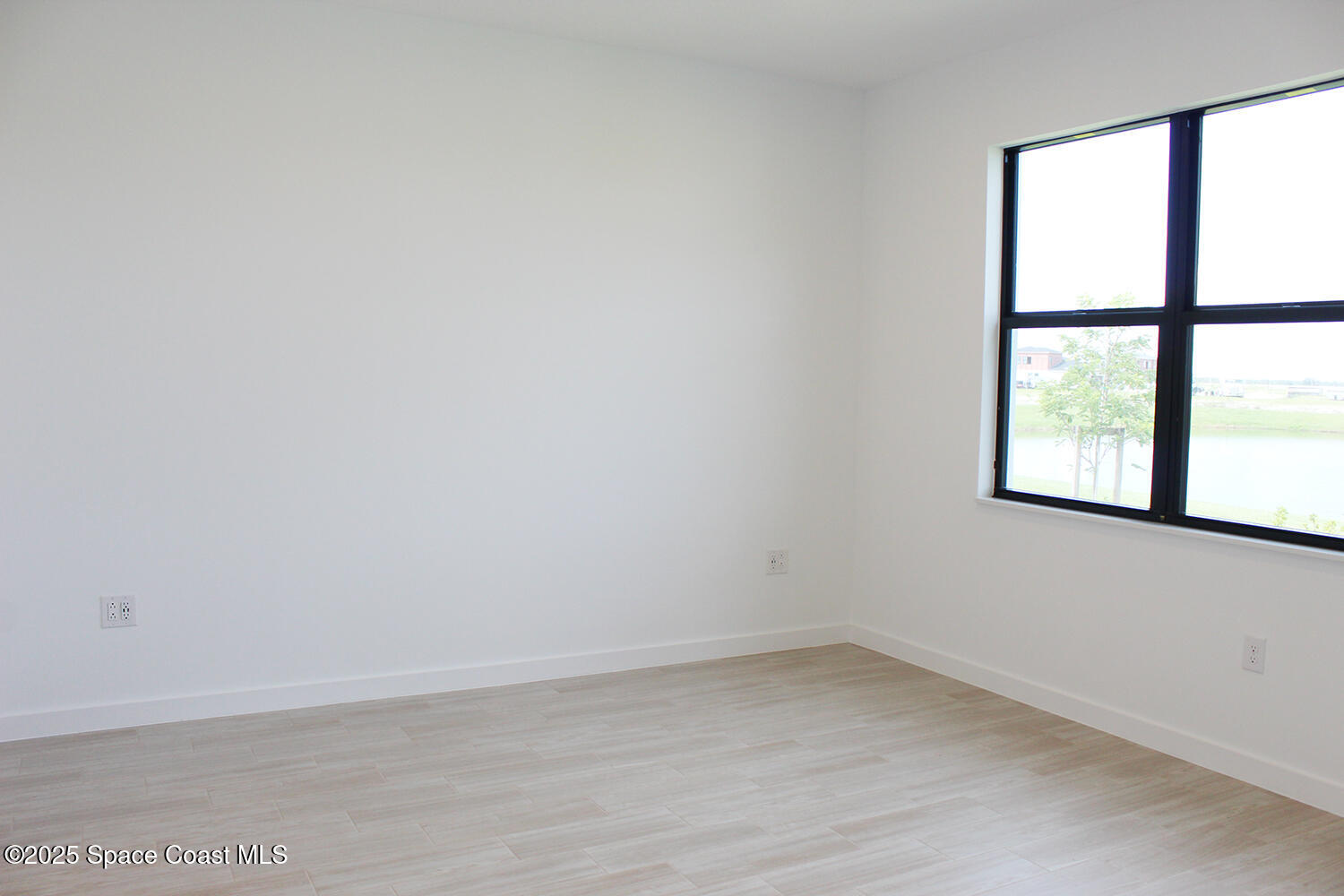 8528 Rocard Court Melbourne, FL 32940 - Photo 5 of 9 CharlotteII_3FF_bedroom