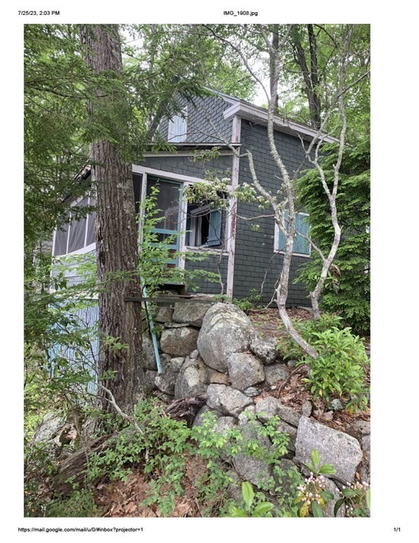 46 Dusty Road Erving, MA 01344 - Photo 1 of 14 a backyard of a house with lots of green space