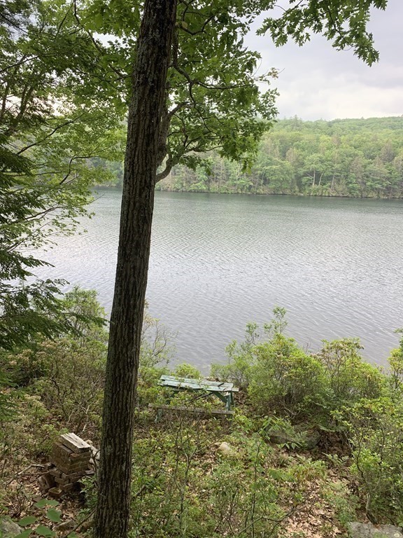 46 Dusty Road Erving, MA 01344 - Photo 12 of 14 a view of a lake with a mountain in the background