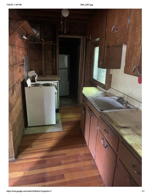 46 Dusty Road Erving, MA 01344 - Photo 6 of 14 a bathroom with a sink and a mirror