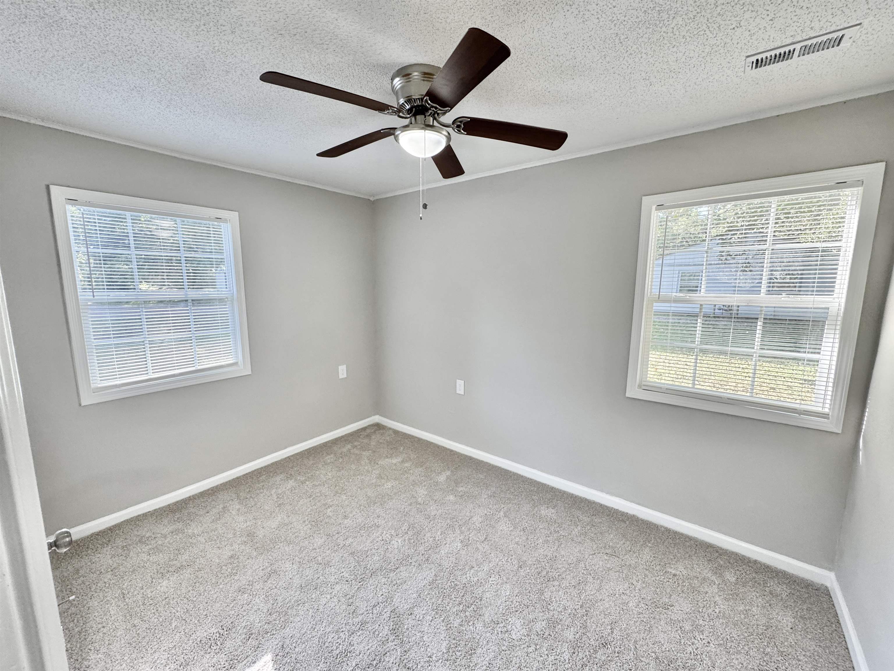 7881 Sherman Road Millington, TN 38053 - Photo 15 of 30 a view of an empty room with a window