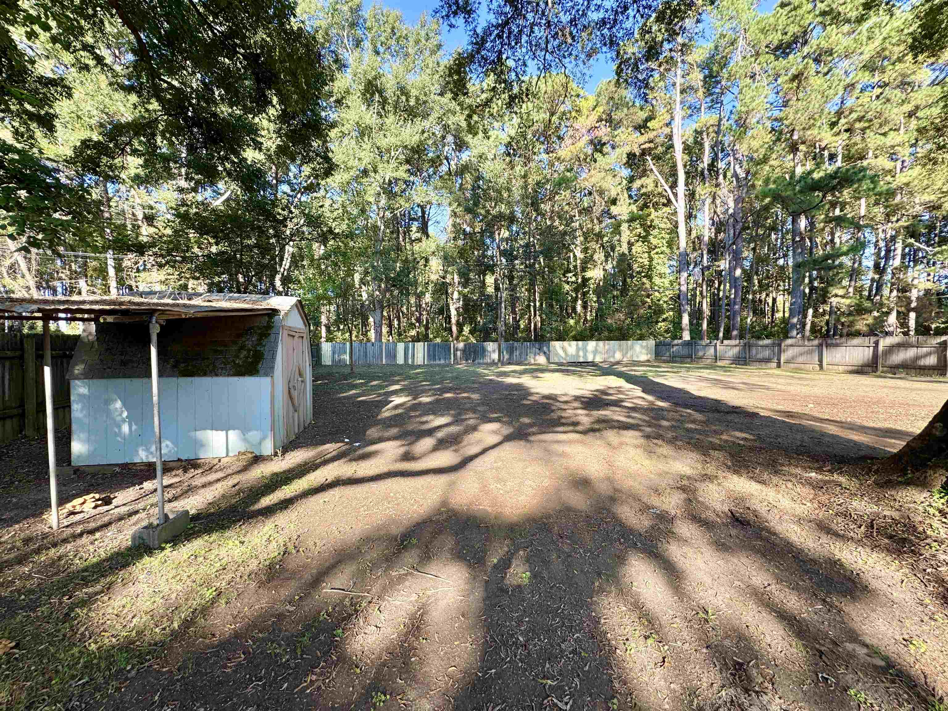 7881 Sherman Road Millington, TN 38053 - Photo 29 of 30 a backyard of a house with lots of green space