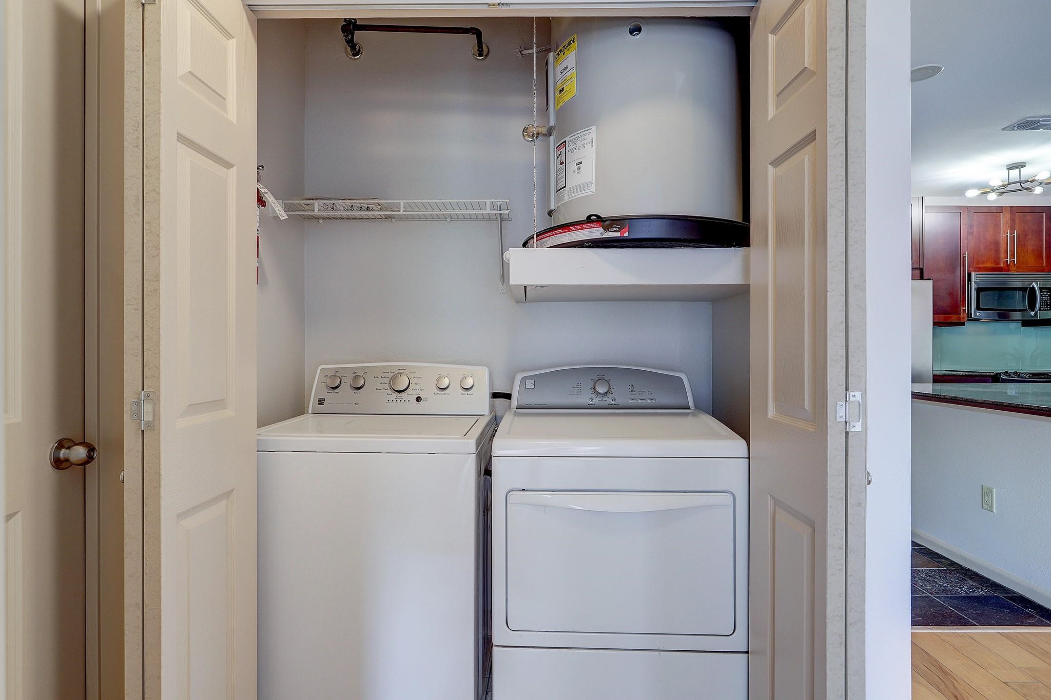 3505 Sage Road, Unit 207 Houston, TX 77056 - Photo 14 of 21 The utility space is conveniently located just outside the bedroom.