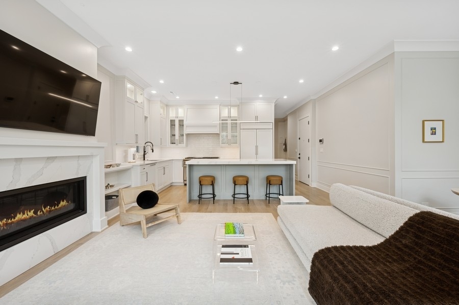 2136 North Cleveland Avenue, Unit 2 Chicago, IL 60614 - Photo 20 of 38 a living room with furniture and a fireplace