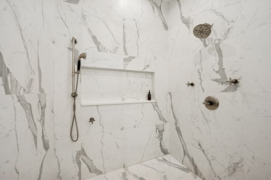 2136 North Cleveland Avenue, Unit 2 Chicago, IL 60614 - Photo 30 of 38 a bathroom with a shower