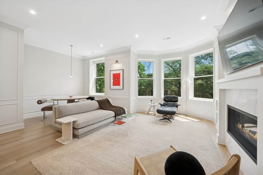 2136 North Cleveland Avenue, Unit 2 Chicago, IL 60614 - Photo 10 of 38 a living room with furniture and a fireplace