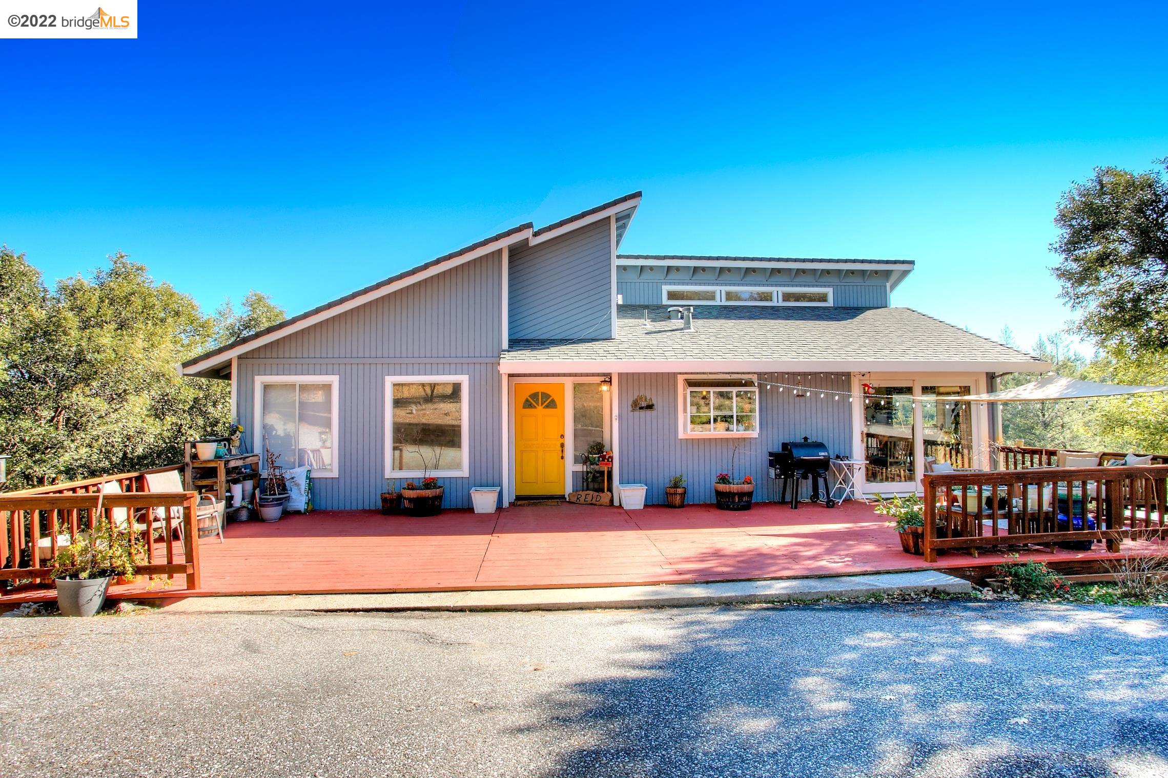 22320 Gunsight Road Colfax, CA 95713 - Photo 1 of 1 a view of a house with a big yard