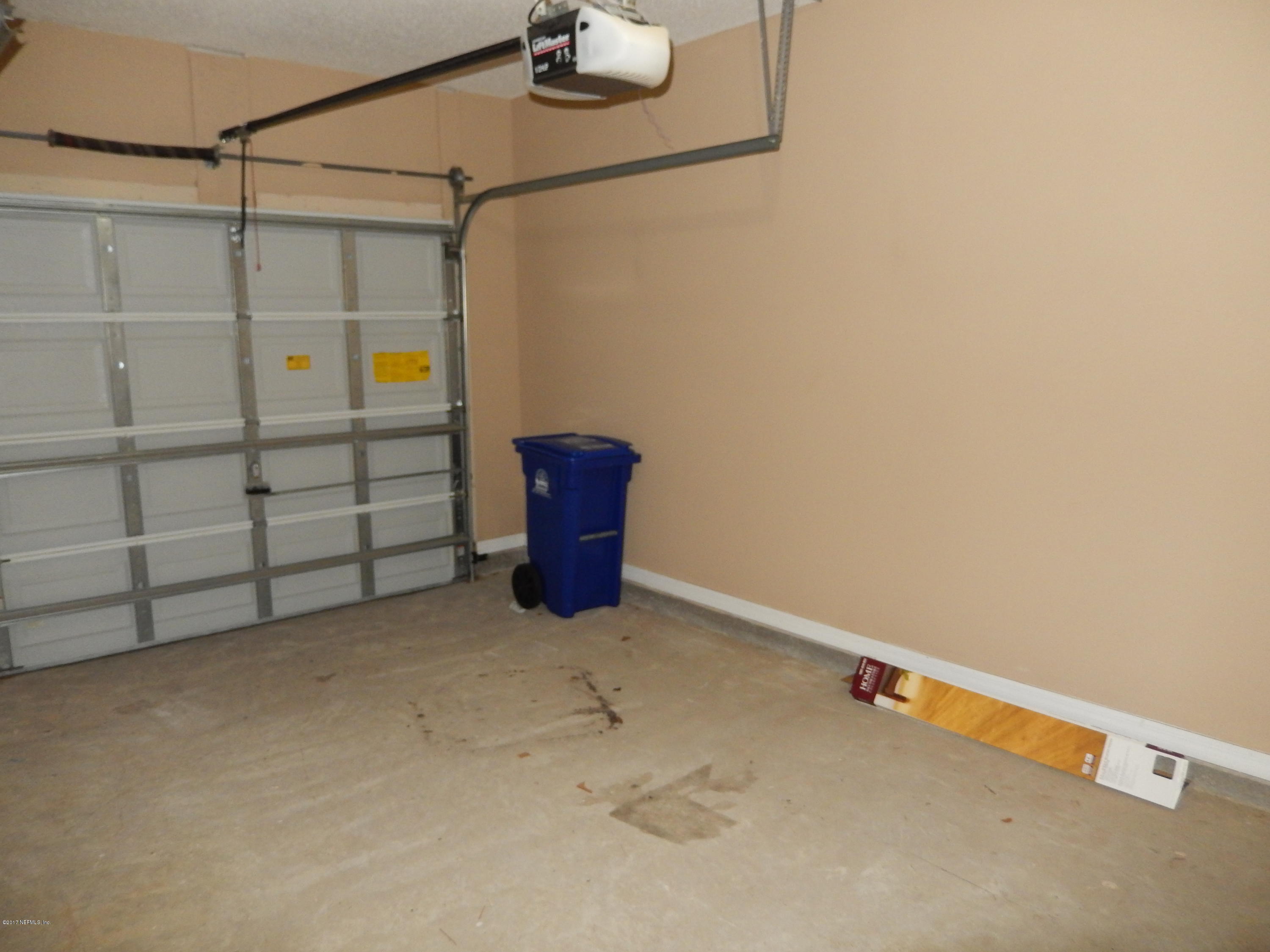 778 Ginger Mill Drive Jacksonville, FL 32259 - Photo 4 of 19 a view of storage and utility room with empty racks