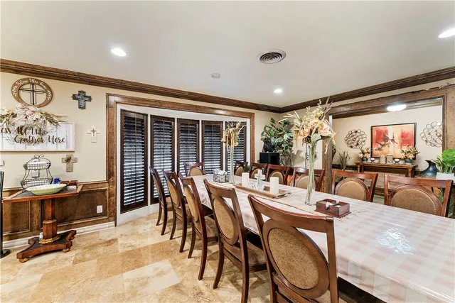a view of a dining room with furniture