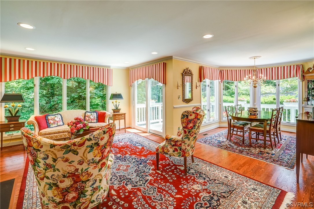 3113 Stony Point Road, Unit UE Richmond, VA 23235 - Photo 16 of 48 a living room with furniture and a floor to ceiling window