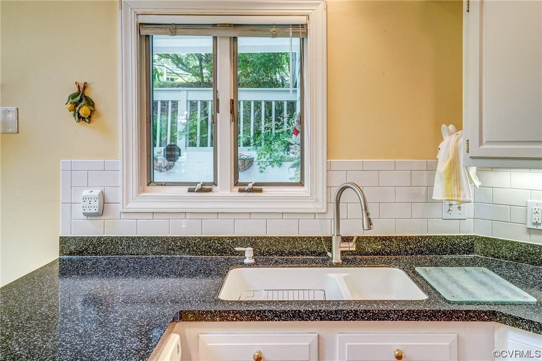 3113 Stony Point Road, Unit UE Richmond, VA 23235 - Photo 26 of 48 a kitchen with granite countertop a sink and a window