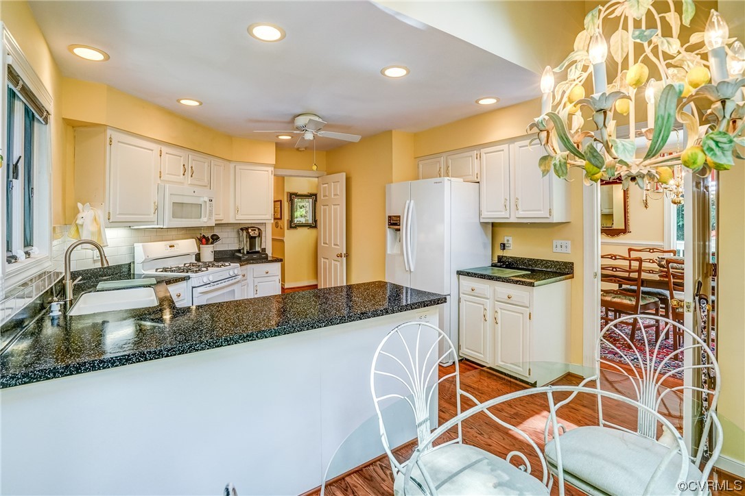 3113 Stony Point Road, Unit UE Richmond, VA 23235 - Photo 28 of 48 a kitchen with stainless steel appliances granite countertop a sink a stove and a refrigerator
