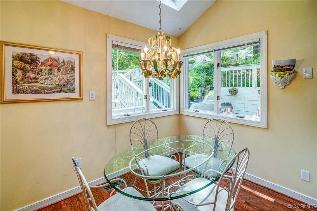 3113 Stony Point Road, Unit UE Richmond, VA 23235 - Photo 29 of 48 a dining room with furniture and a window