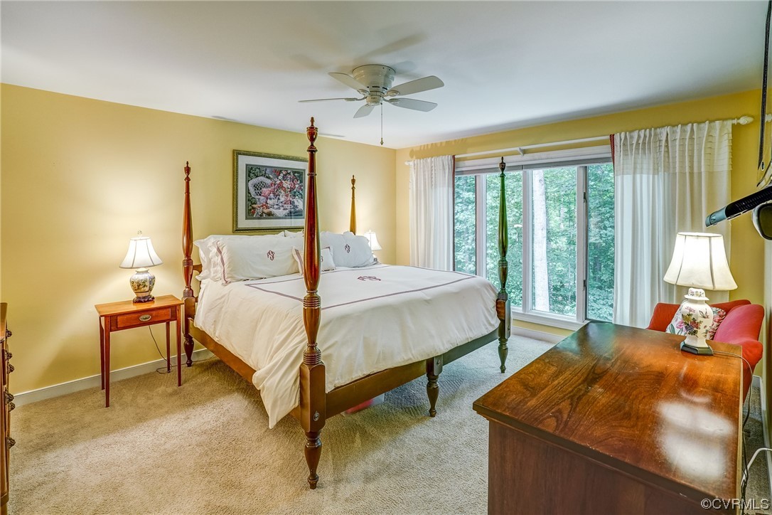 3113 Stony Point Road, Unit UE Richmond, VA 23235 - Photo 31 of 48 a bed sitting in a bedroom next to a window