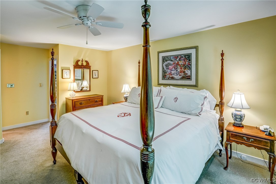 3113 Stony Point Road, Unit UE Richmond, VA 23235 - Photo 33 of 48 a bed room with a bed and a chandelier