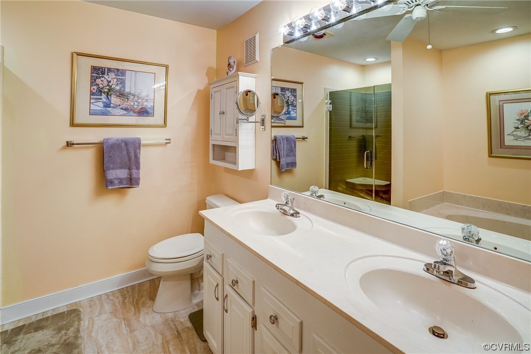 3113 Stony Point Road, Unit UE Richmond, VA 23235 - Photo 34 of 48 a bathroom with a sink and a mirror