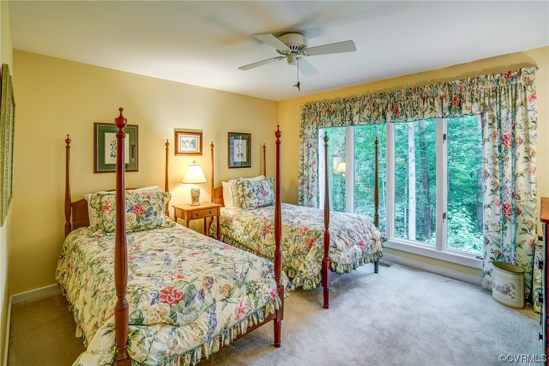 3113 Stony Point Road, Unit UE Richmond, VA 23235 - Photo 38 of 48 a bedroom with a bed and large windows