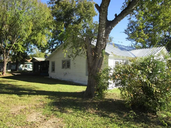 a view of a house with swimming pool