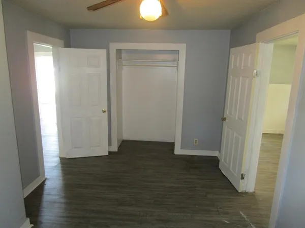 a view of entryway with wooden floor