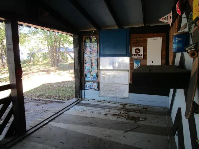 a view of entry way with wooden floor