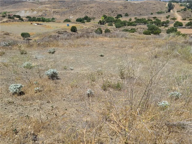 a view of a lake with mountains in the background