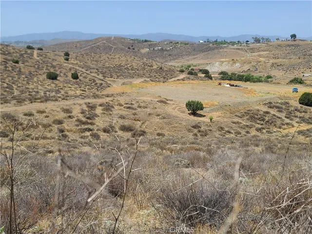 a view of swimming pool with mountain and lake view