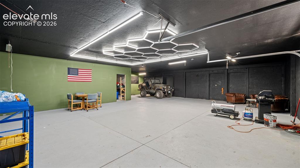 33975 Highway 94 Yoder, CO 80864 - Photo 22 of 40 Spacious interior space featuring a concrete floor and a black ceiling