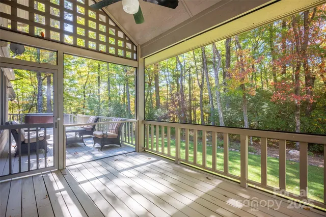 a view of balcony with couch and wooden floor