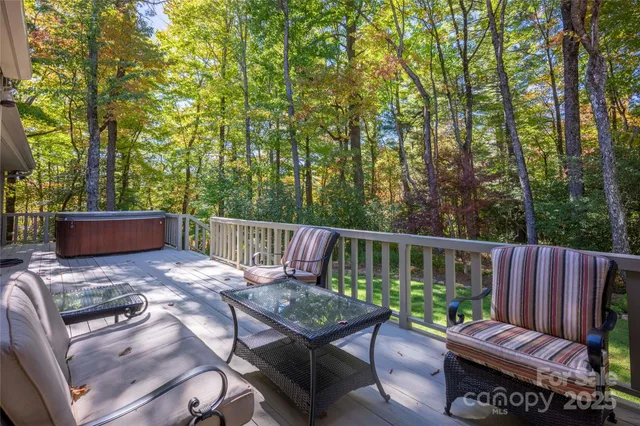 a view of a deck with furniture