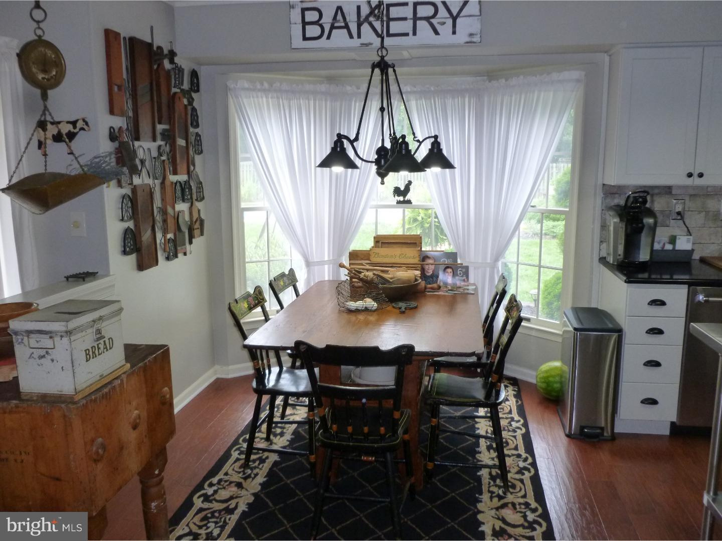 37 Manchester Road Eastampton, NJ 08060 - Photo 11 of 25 a view of a dining room with furniture and a window