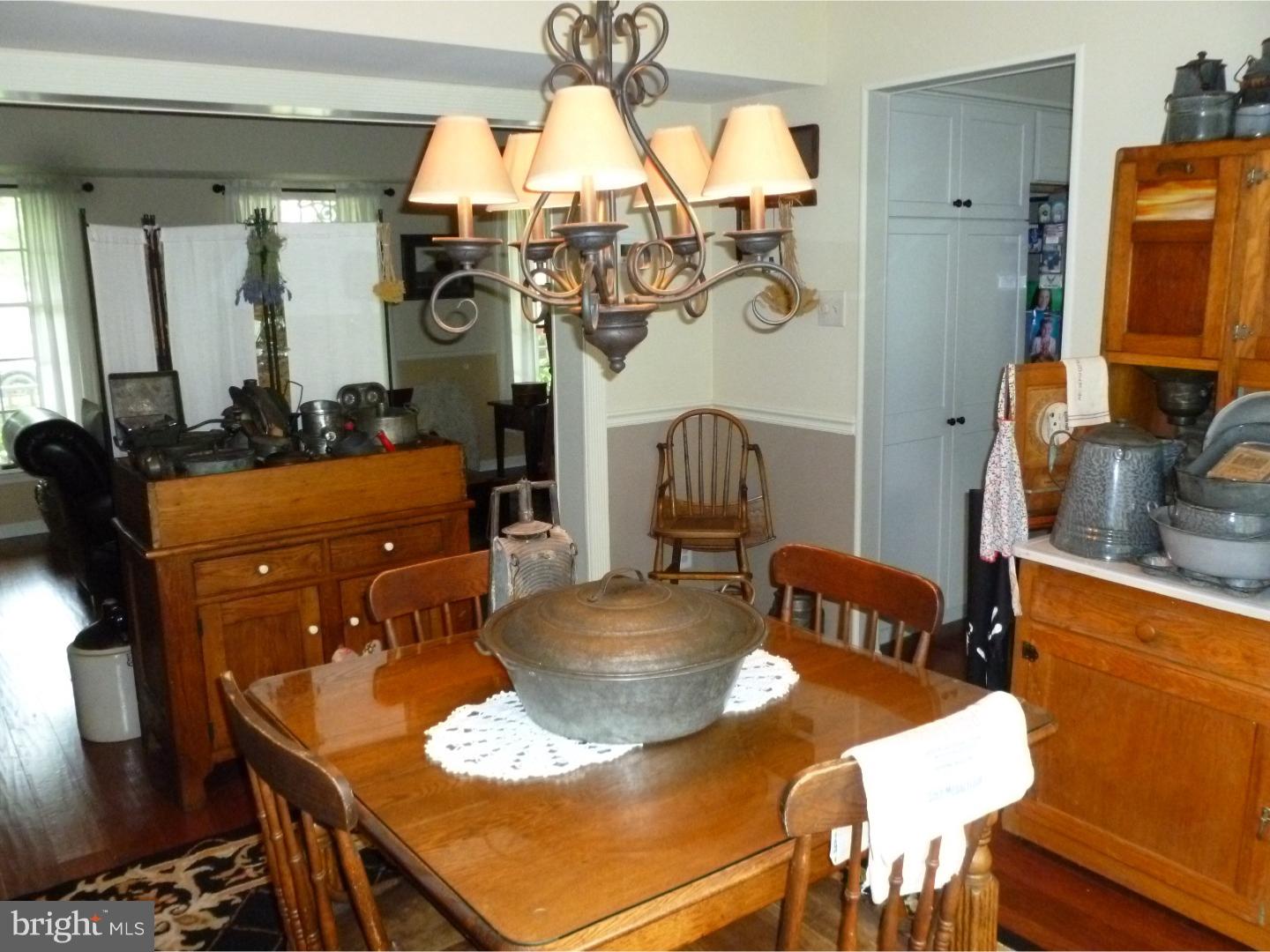 37 Manchester Road Eastampton, NJ 08060 - Photo 12 of 25 a dining room with furniture and wooden floor