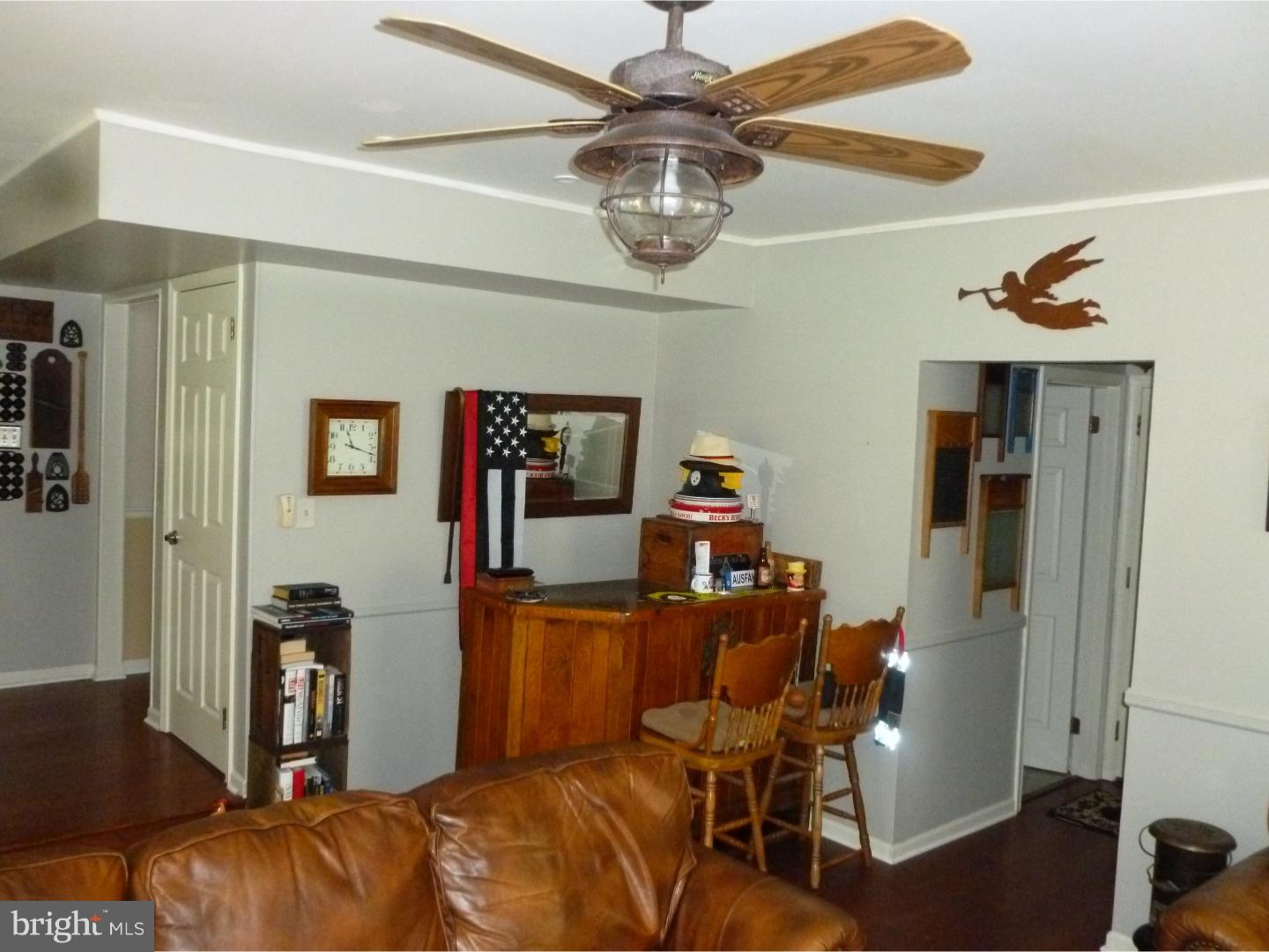 37 Manchester Road Eastampton, NJ 08060 - Photo 17 of 25 a workspace with furniture and wooden floor