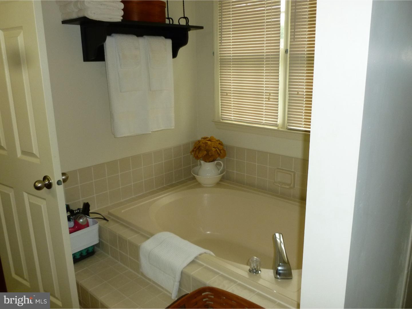 37 Manchester Road Eastampton, NJ 08060 - Photo 21 of 25 a bathroom with a sink and bathtub
