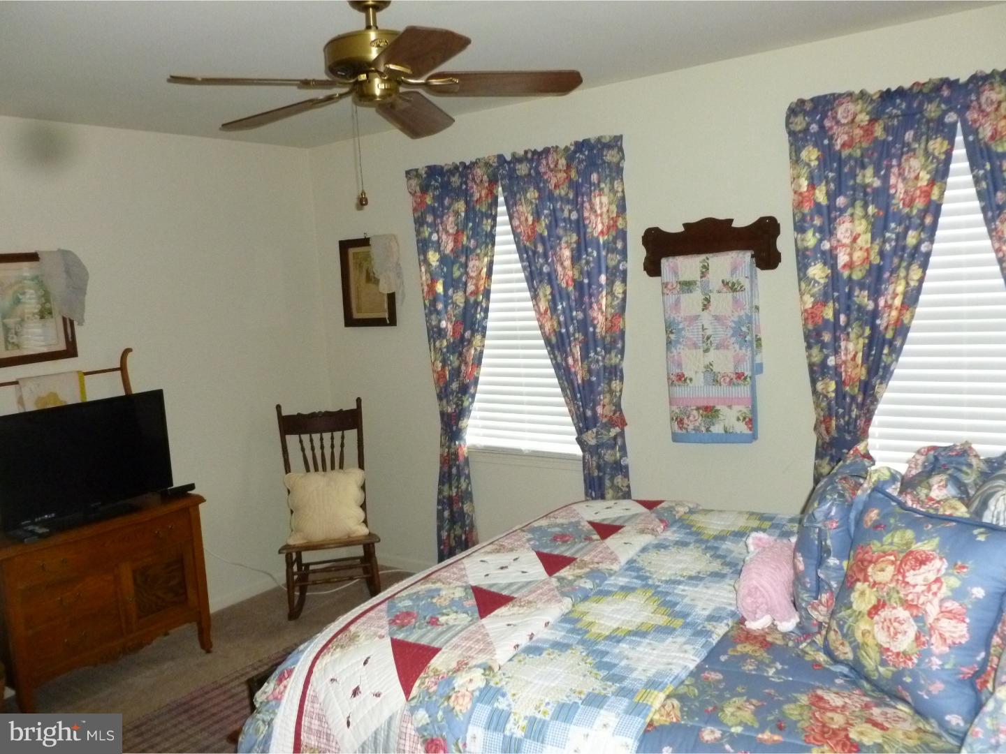37 Manchester Road Eastampton, NJ 08060 - Photo 25 of 25 a bedroom with a bed and a television