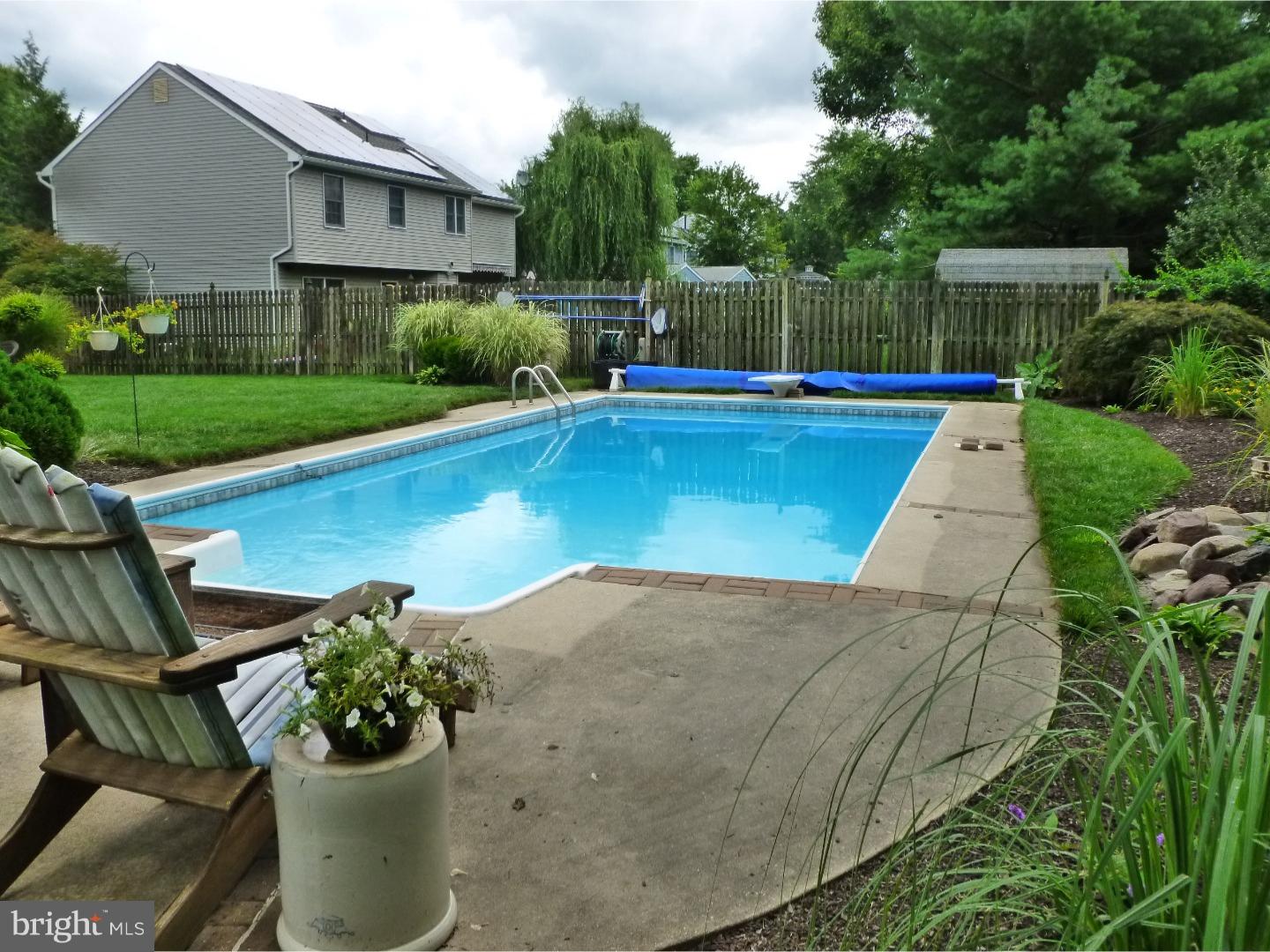 37 Manchester Road Eastampton, NJ 08060 - Photo 4 of 25 a view of a backyard with swimming pool