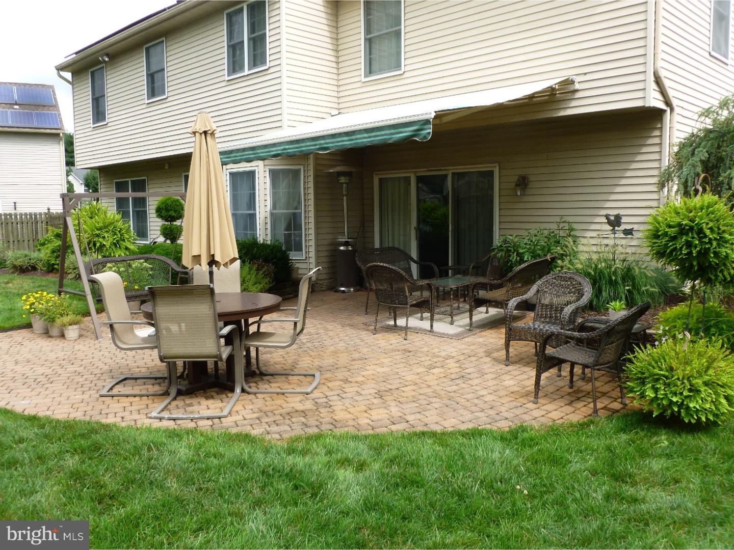 37 Manchester Road Eastampton, NJ 08060 - Photo 5 of 25 a view of a house with backyard and sitting area