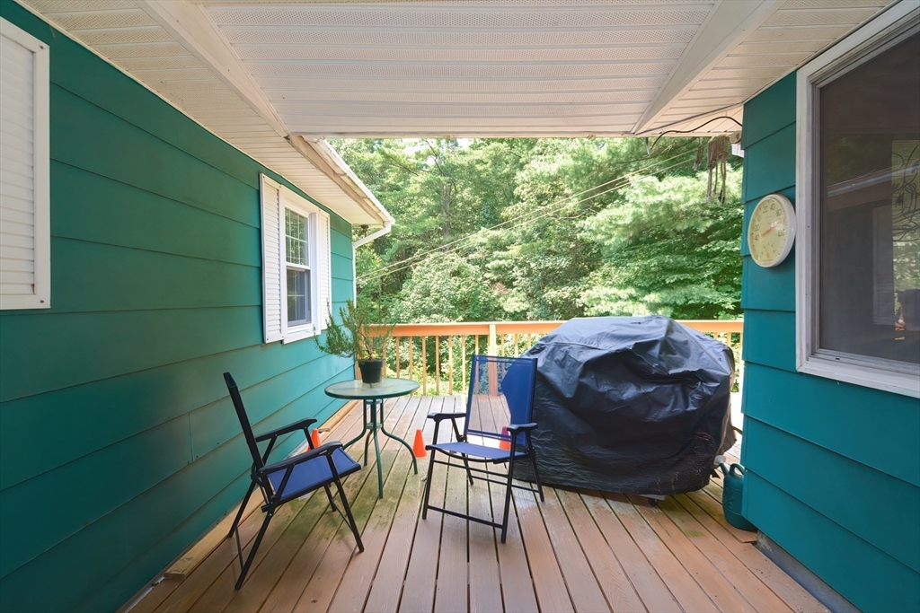 40 Eastern Avenue Lunenburg, MA 01462 - Photo 11 of 42 a view of a two chairs in the deck