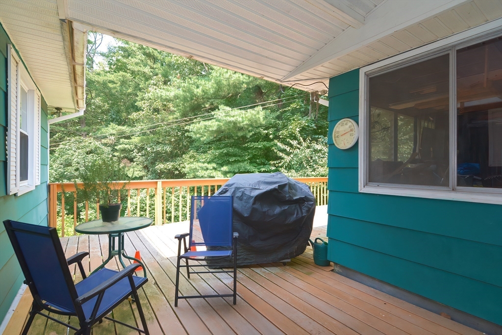 40 Eastern Avenue Lunenburg, MA 01462 - Photo 12 of 42 a backyard of a house with table and chairs
