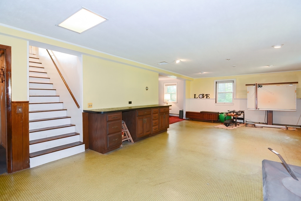 40 Eastern Avenue Lunenburg, MA 01462 - Photo 35 of 42 a view of a livingroom with furniture and staircase