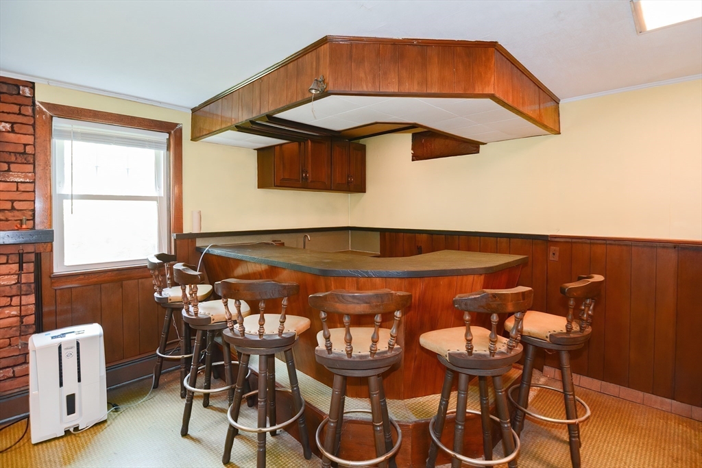40 Eastern Avenue Lunenburg, MA 01462 - Photo 37 of 42 a blue table and chairs in a blue room
