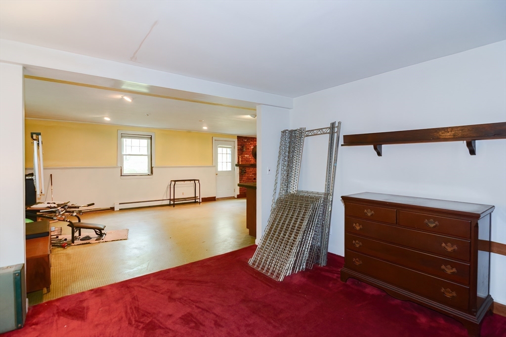 40 Eastern Avenue Lunenburg, MA 01462 - Photo 41 of 42 a view of a room with wooden floor and wardrobe