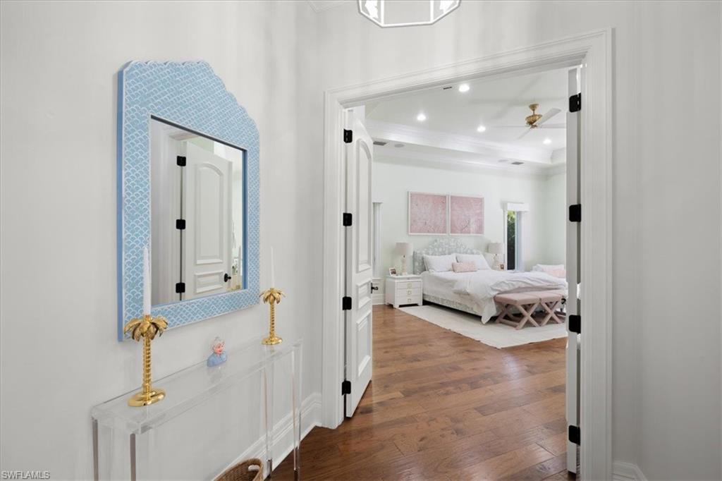 610 Springline Drive Naples, FL 34102 - Photo 29 of 49 a bathroom with a tub and shower