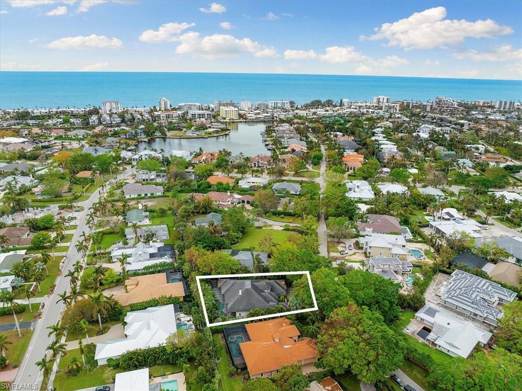 610 Springline Drive Naples, FL 34102 - Photo 48 of 49 an aerial view of multiple house