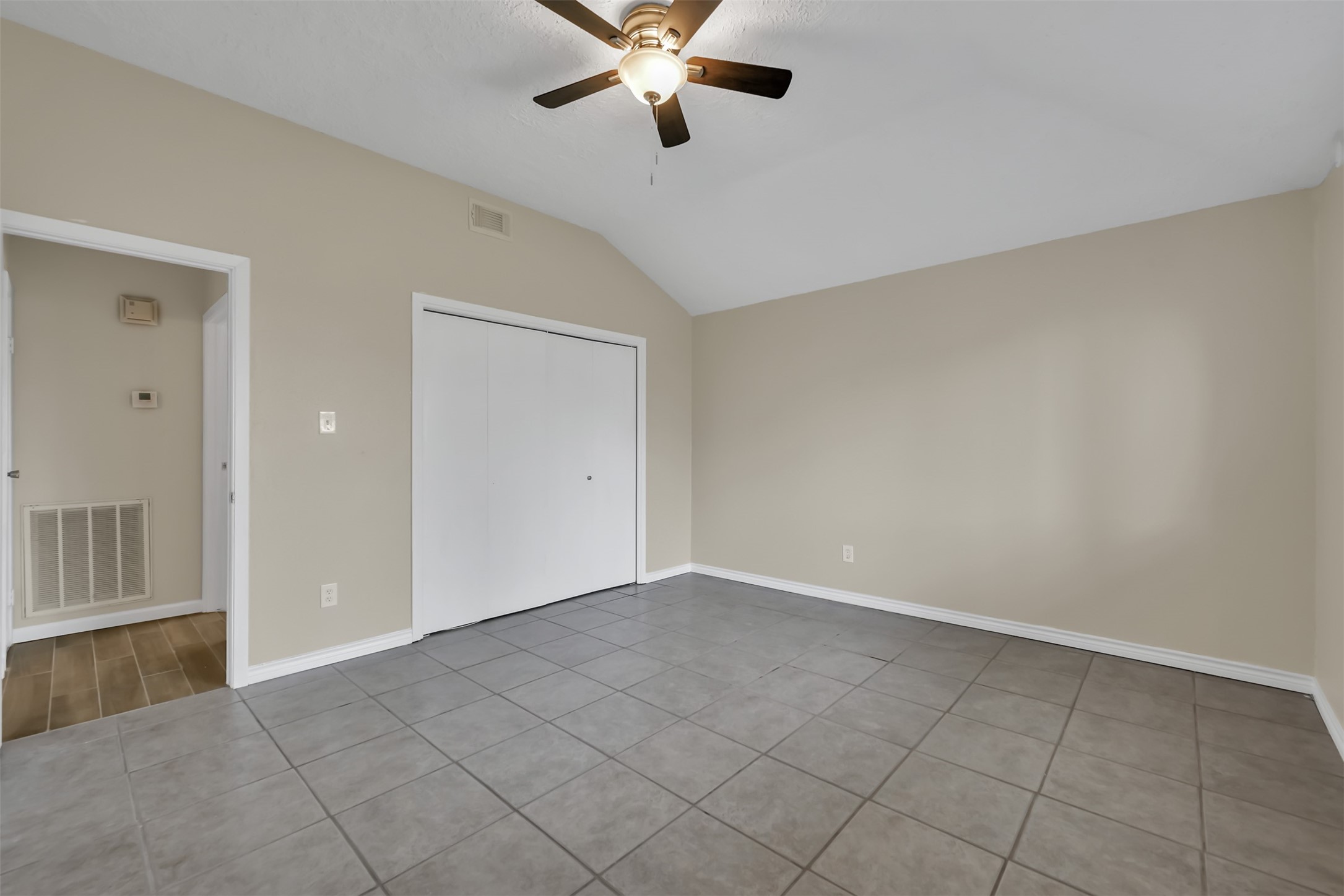 22112 Peachglen Lane Spring, TX 77373 - Photo 11 of 17 wooden floor in an empty room with a window