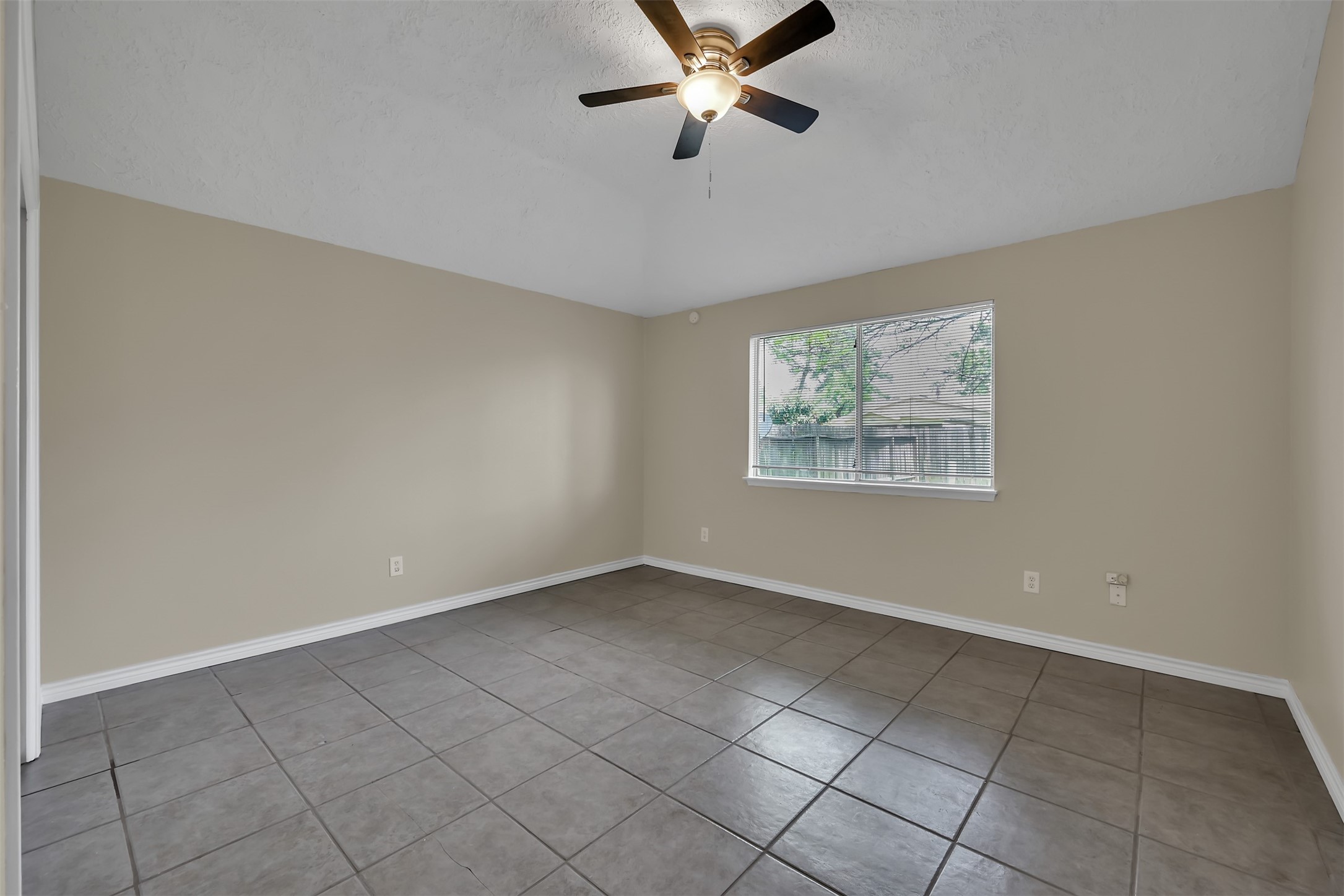 22112 Peachglen Lane Spring, TX 77373 - Photo 9 of 17 a view of an empty room with a window
